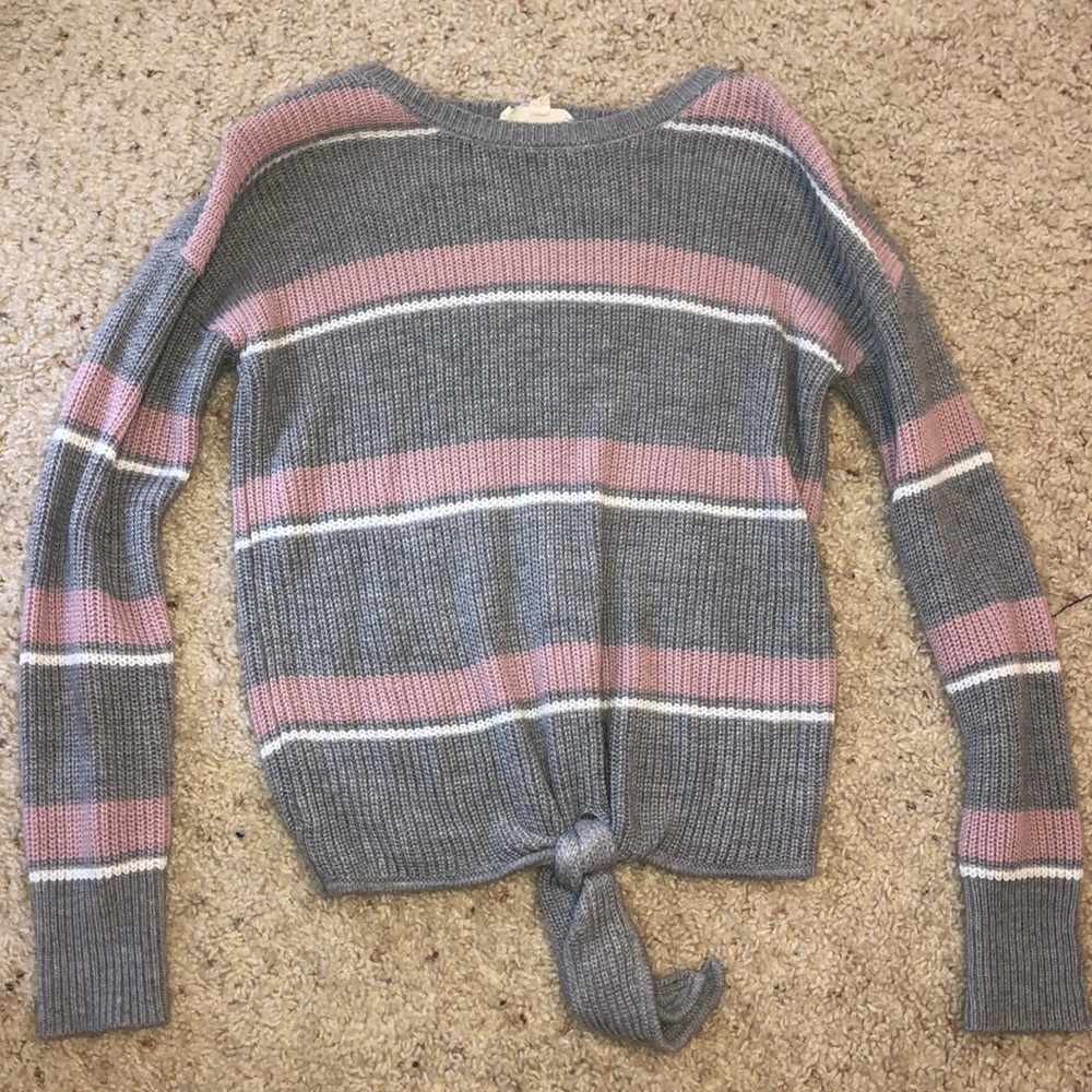 Gray, pink, and white striped sweater.